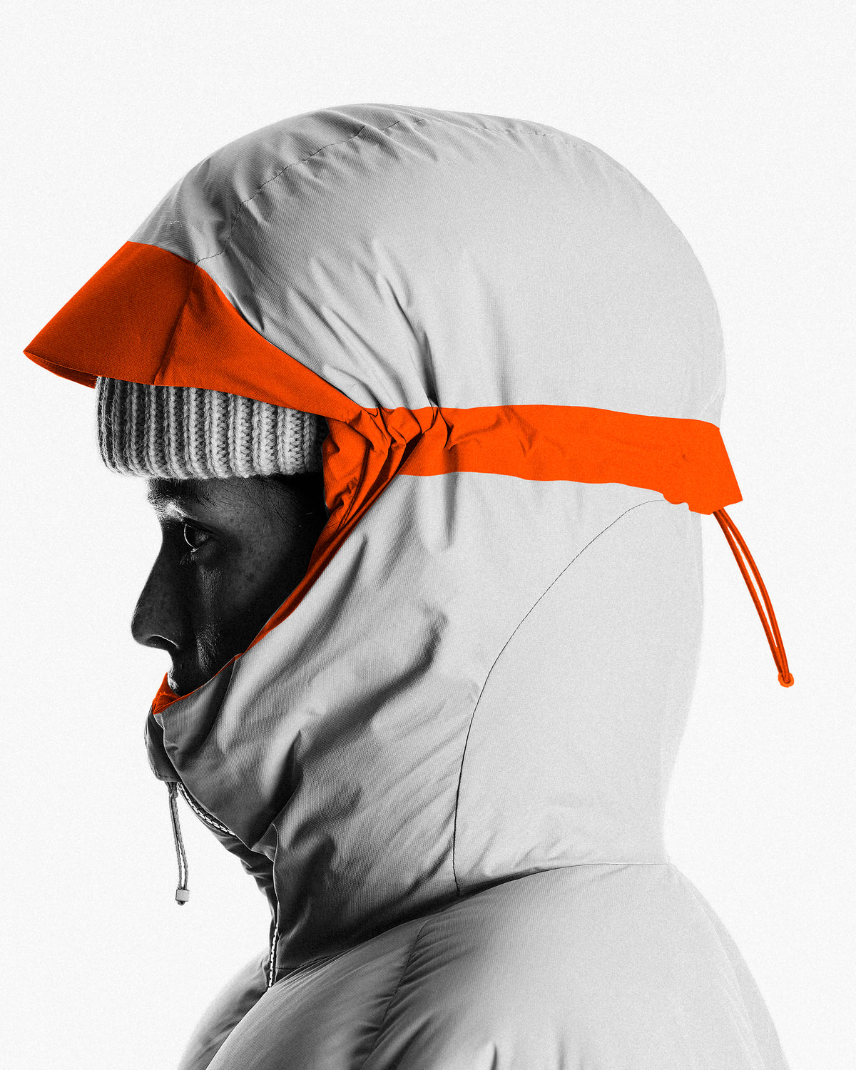 Helmet-compatible hood with two-way adjustment