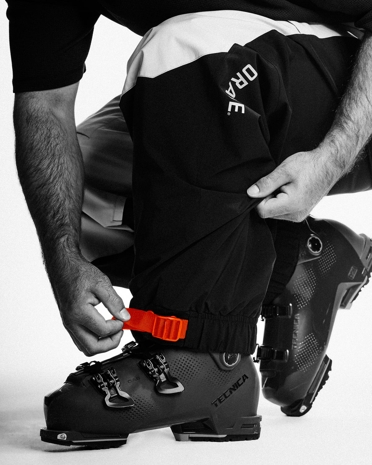Adjustable hem openings for an easy fit over boots