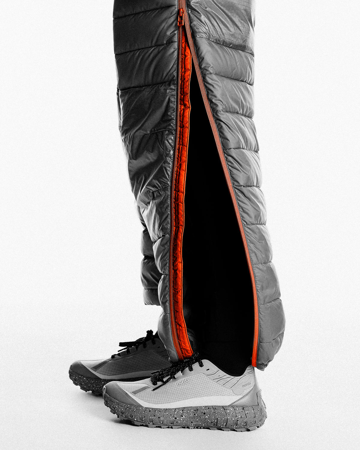 Full-length two-way side zippers with snap closures