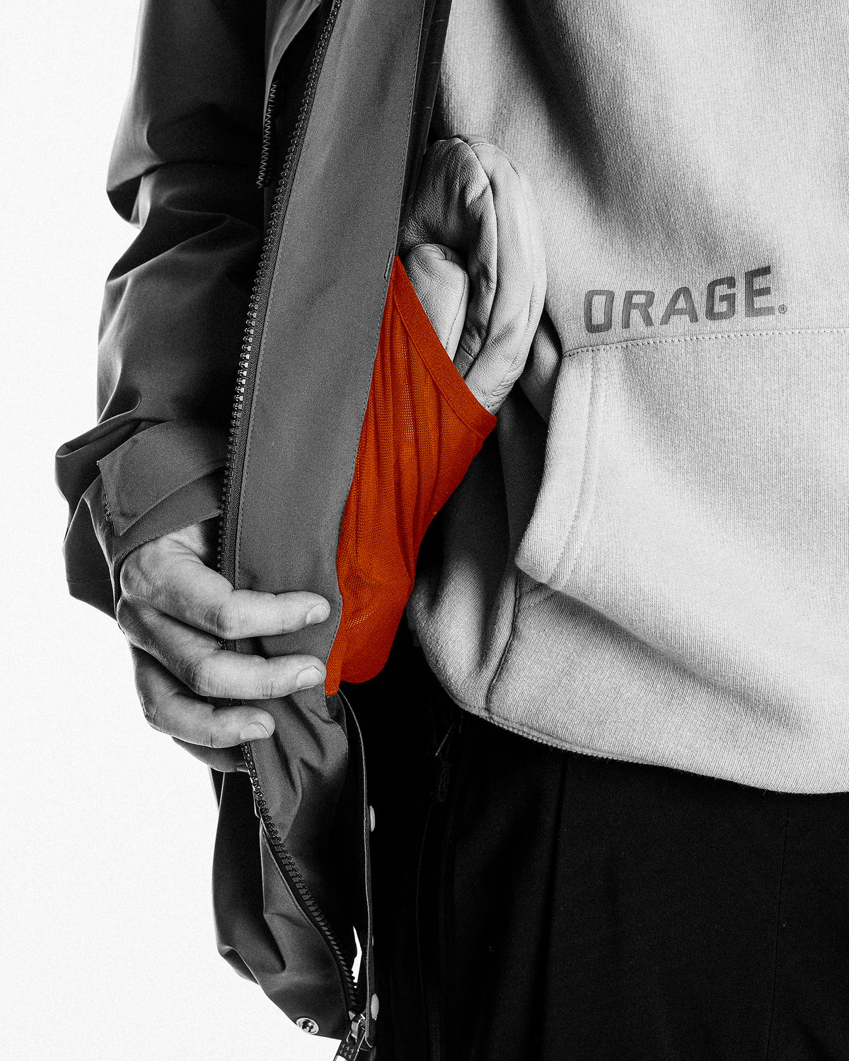 Mesh goggle pocket for secure, scratch-free storage