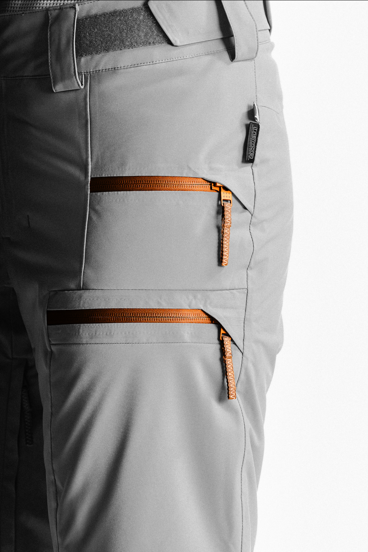 Zipped ski pass pocket on the left leg